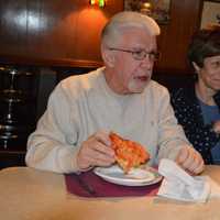 <p>Members of The Spartans chat over pizza at Patsy&#x27;s in Paterson.</p>