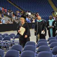 <p>The Class of 2016 from Fairchild Wheeler High marches into the Webster Bank Arena.</p>