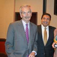 <p>LifeBridge board member Larry Ganim, center, with Ernest and Joan Trefz of Trumbull.</p>