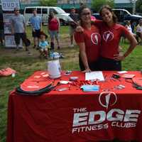 <p>The Edge Fitness Club hands out membership information.</p>