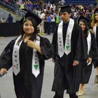 <p>The students get ready to take their seats for the commencement exercises.</p>