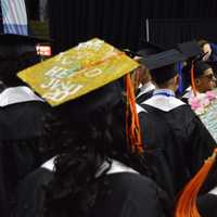 <p>A decorated mortarboard</p>