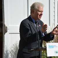 <p>Michael Kaplowitz, chair of the Westchester County Board of Legislators, speaks at the Muscoot Farm renaming ceremony in Somers. The farm was renamed in honor of the late County Executive Al DelBello.</p>