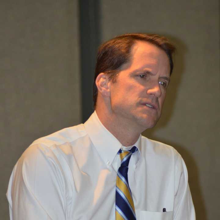 U.S. Rep. Jim Himes listens to a question from a constituent during a town hall-style meeting in Wilton last week.