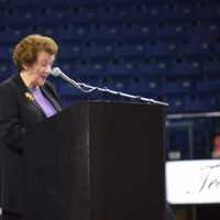 <p>Interim Superintendent Frances Rabinowitz speaks at the Fairchild Wheeler High graduation</p>