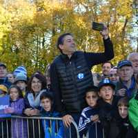 <p>Throngs of supporters gather in front of Douglas G. Grafflin Elementary School for Hillary and Bill Clinton after the pair cast their presidential votes.</p>