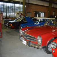 <p>Some of the many cars getting a facelift at Redline Restorations in Bridgeport.</p>