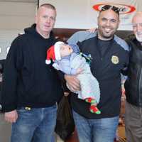 <p>From left: Fairview Police Capt. Dave Brennan, Palisades Park Police Officer Michael DeBartolo -- with Michael Jr. -- Dominic &quot;Uncle Junior&quot; Chianese, Norwood Sgt. Paul Capu.</p>