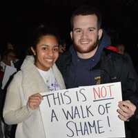 <p>Students gather outside at WestConn&#x27;s Midtown campus in Danbury. They walked around the quad chanting and waving signs to raise awareness to stop domestic and sexual abuse violence.</p>