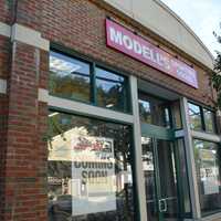 <p>Construction is under way for a Modell's Sporting Goods store at the former Borders site in downtown Mount Kisco. Signage is pictured facing East Main Street.</p>