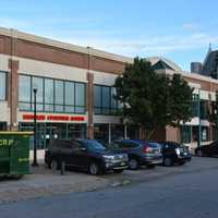 <p>Construction is under way for a Modell's Sporting Goods store at the former Borders site in downtown Mount Kisco. The building is pictured at is section facing a parking lot.</p>