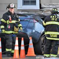 <p>Hackensack firefighters helped their New Milford colleagues free the driver following Sunday&#x27;s crash on River Road.</p>