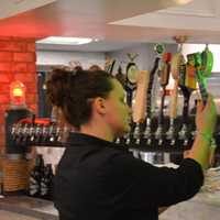 <p>Beer on tap is served at DeCicco &amp; Sons' newest location in Millwood.</p>