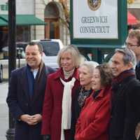 <p>Officials pose in front of a new sign that marks the Greenwich Municipal Center Historic District on Monday. The sign is one of nine that will be placed throughout town. </p>