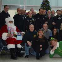 <p>Bergen County PBA members and HUMC officials gather for a picture before distributing gifts.</p>