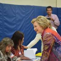 <p>Hillary Clinton checks in to her polling place at Chappaqua&#x27;s Douglas G. Grafflin Elementary school in order to vote in New York&#x27;s Democratic presidential primary.</p>