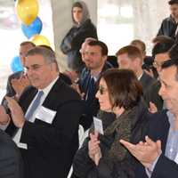 <p>Attendees give a round of applause prior to a ceremonial groundbreaking at Chappaqua Crossing.</p>