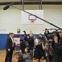 <p>A gaggle of reporters assembles in the gym at Chappaqua&#x27;s Douglas G. Grafflin Elementary School, which serves as Hillary Clinton&#x27;s polling place.</p>