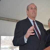 <p>Westchester Deputy County Executive Kevin Plunkett speaks prior to a symbolic groundbreaking at Chappaqua Crossing.</p>