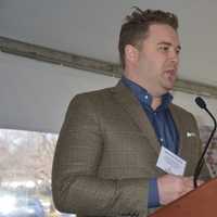 <p>Michael Sinatra, a regional representative from Whole Foods, speaks before a ceremonial groundbreaking at Chappaqua Crossing. Whole Foods will be an anchor retail tenant on the site.</p>