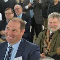 <p>In contrast to tense meetings over the years, Tuesday&#x27;s Chappaqua Crossing groundbreaking was calm. Pictured in the foreground are New Castle Town Board members Adam Brodsky and Lisa Katz. Summit/Greenfield attorney John Marwell is in the background.</p>