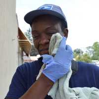 <p>A towel is the only line of defense Terry Ann Johnson has as she delivers the mail in downtown Ramsey.</p>