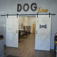 <p>Barn doors add a homey feel to Wet Paws Dog Grooming of Trumbull.</p>