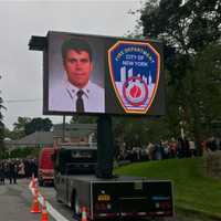 <p>Thousands of firemen, NYPD, public officials and civilian attendees lined the streets around the Church of the Annunciation to mourn FDNY Battalion Chief Michael Fahy, killed Tuesday in a Bronx building explosion.</p>