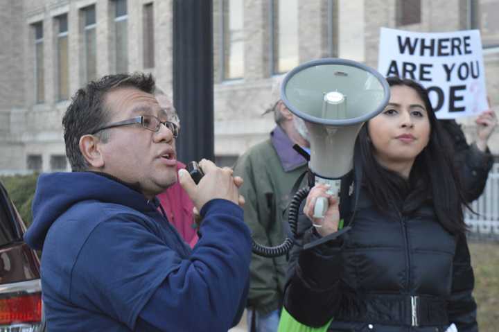 Bridgeport City Council member José Casco and Make the Road youth organizer Alison Martinez rally the crowd in support of naming Bridgeport a sanctuary city earlier this year.