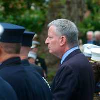 <p>Thousands of firemen, NYPD, public officials and civilian attendees lined the streets around the Church of the Annunciation to mourn FDNY Battalion Chief Michael Fahy, killed Tuesday in a Bronx building explosion. Pictured: NYC Mayor Bill de Blasio.</p>