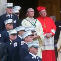 <p>Thousands of firemen, NYPD, public officials and civilian attendees lined the streets around the Church of the Annunciation to mourn FDNY Battalion Chief Michael Fahy, killed Tuesday in a Bronx building explosion.</p>