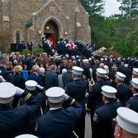 <p>Thousands of firemen, NYPD, public officials and civilian attendees lined the streets around the Church of the Annunciation to mourn FDNY Battalion Chief Michael Fahy, killed Tuesday in a Bronx building explosion.</p>