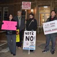 <p>About a dozen demonstrators protested the Towne Center at Shelter Ridge project at Shelton City Hall.</p>