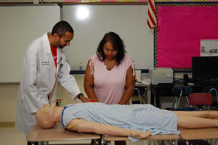 Dr. Farrukh N. Jafri, the assistant director of Education and Simulation , Emergency Department at White Plains Hospital led the training of staff at White Plains schools in emergency bleeding control.