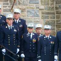 <p>Thousands of firemen, NYPD, public officials and civilian attendees lined the streets around the Church of the Annunciation to mourn FDNY Battalion Chief Michael Fahy, killed Tuesday in a Bronx building explosion.</p>