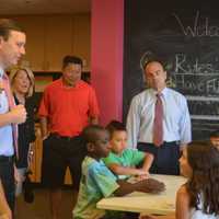 <p>U.S. Sen. Chris Murphy talks with children at the Smilow-Burroughs Clubhouse in Bridgeport.</p>