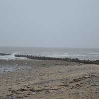 <p>White caps hit the shore at Burying Hill Beach in Westport Thursday, as rain pelted the region all day.</p>