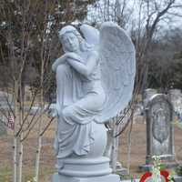 <p>A resting angel statue marks actress Mary Tyler Moore&#x27;s grave in Fairfield.</p>