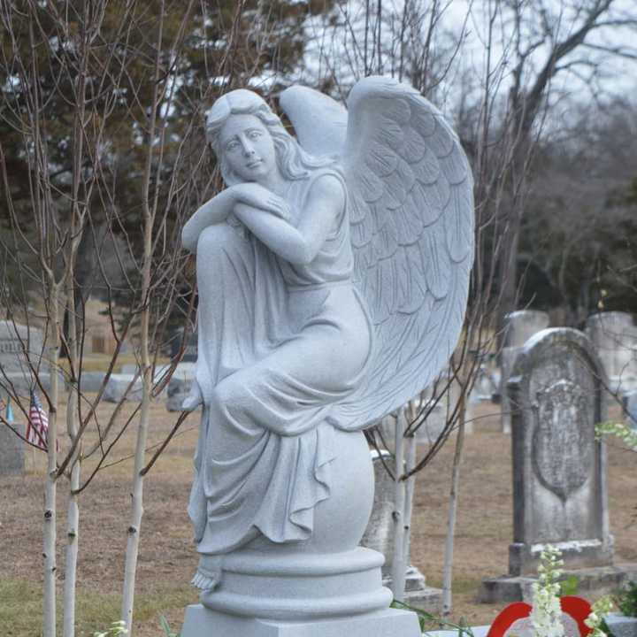 A resting angel statue marks actress Mary Tyler Moore&#x27;s grave in Fairfield.