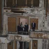 <p>City leaders tour the Majestic Theater, which still retains its massive organ pipes.</p>