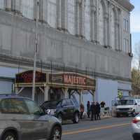 <p>City leaders gather under a new marquee for the shuttered Majestic Theater in Bridgeport.</p>