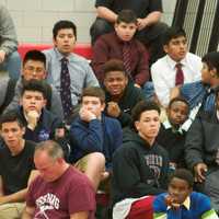 <p>Fans watch the action at the Section 1 Duals.</p>