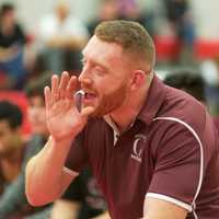 <p>Ossining assistant coach Tom Larm shouts instructions during a match.</p>