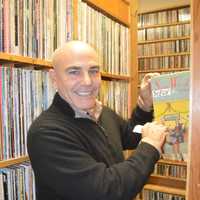 <p>Steve di Costanzo picks a record from the WPKN collection.</p>