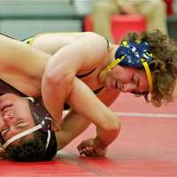 <p>Mahopac&#x27;s Tom Mahoney gets the best of Derek Gonzales of Ossining in a 152-lb. match.</p>