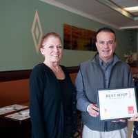 <p>Daily Voice Director of Media Initiatives/Managing Editor Managing Editor Joe Lombardi (center) delivers first-place plaque to Marian Feliciotto (L) and owner Carina Evangelista.</p>