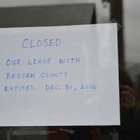 <p>A sign posted on the doorway of the Darlington Golf Center in Mahwah states that the driving range is closed.</p>