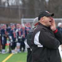 <p>Fox Lane coach Chris Coughlin shout instruction to his players.</p>