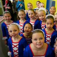 <p>Skaters pose for a photo before competing. </p>