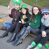 <p>Parade-goers get their green on.</p>